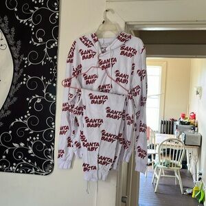 Set, shirt n pants Santa baby, worn one time. Paid $40 brand new